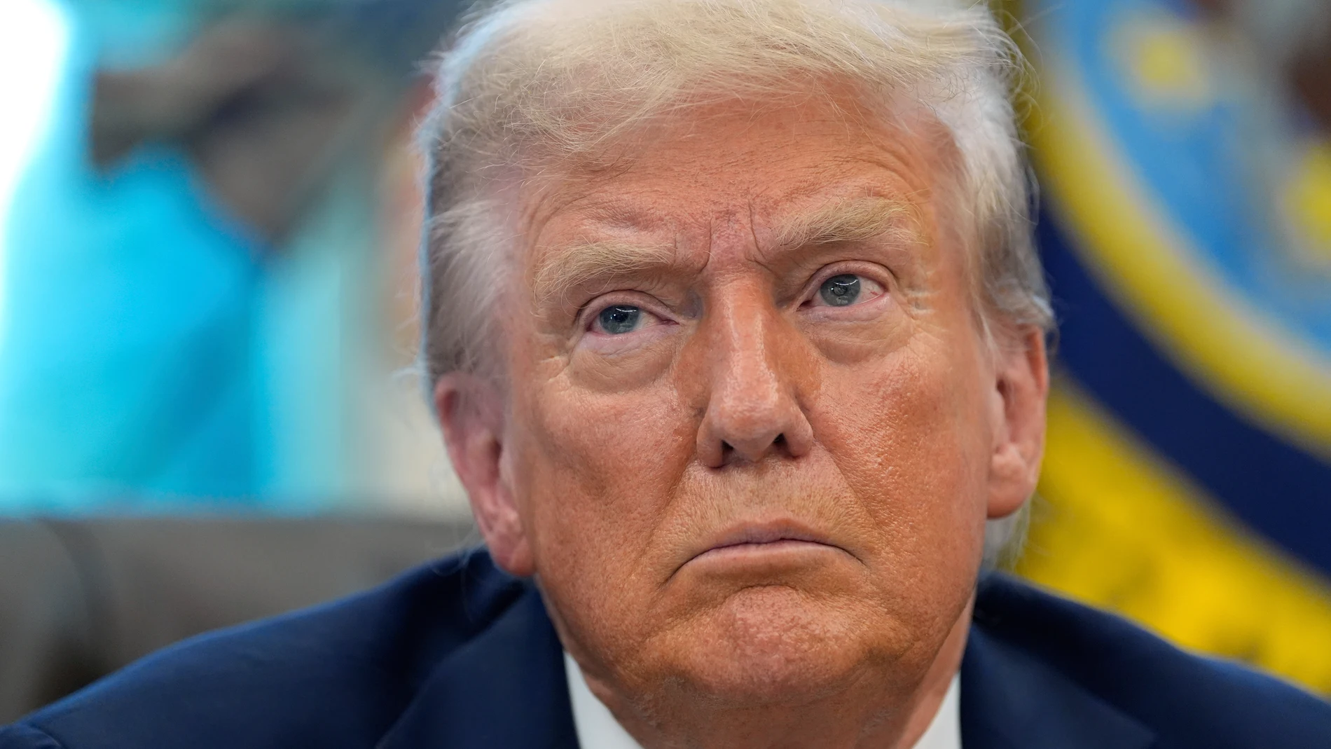 President Donald Trump listens in the Oval Office of the White House, Friday, Sept. 5, 2025, in Washington. (AP Photo/Alex Brandon)
