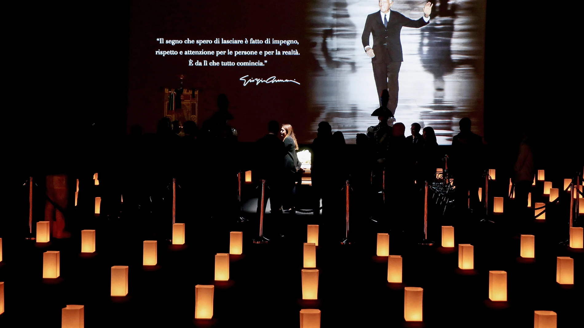 Milan (Italy), 06/09/2025.- People pay their respects to late Italian fashion designer Giorgio Armani at his funeral chapel in Milan, northern Italy, 06 September 2025. The atelier houses the designer's funeral chapel. Armani died at the age of 91 on 04 September 2025. (Moda, Italia) EFE/EPA/MOURAD BALTI TOUATI