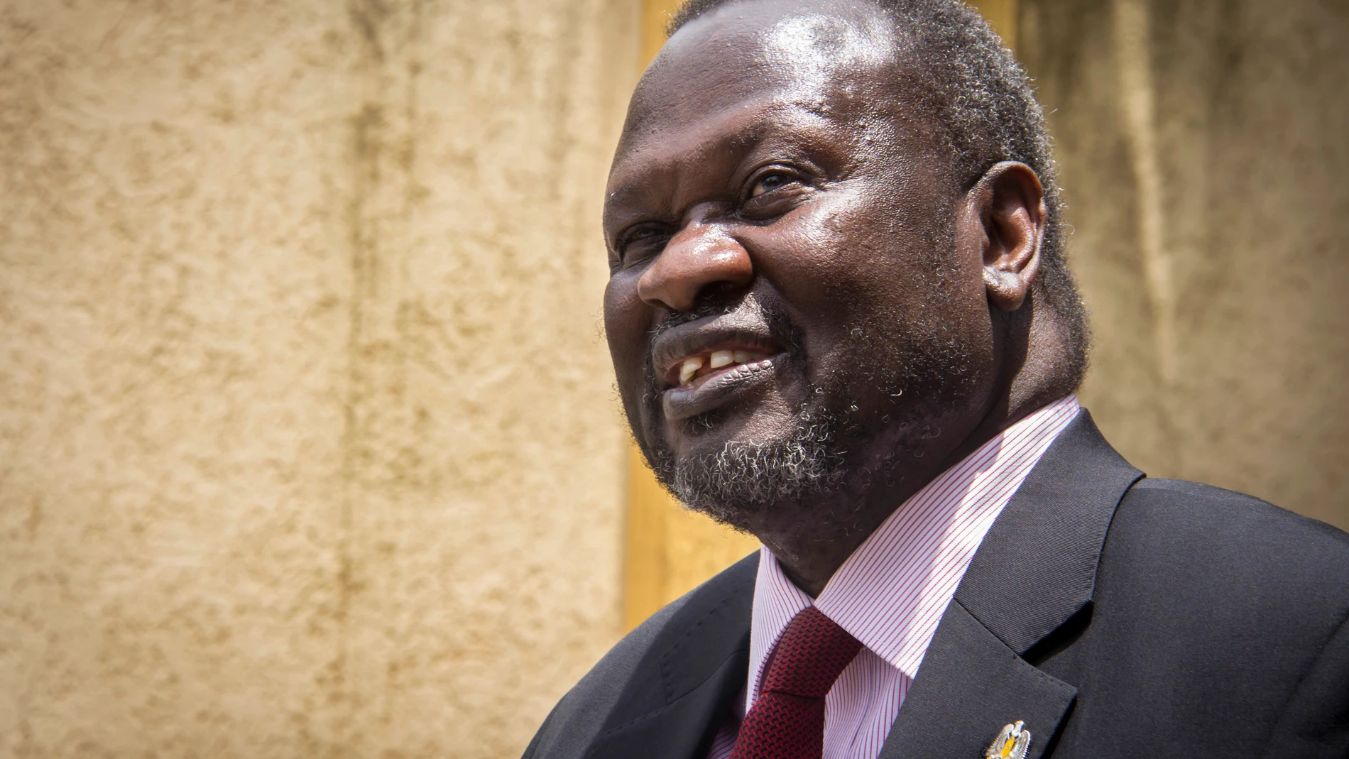 FILE - South Sudan's rebel leader Riek Machar speaks to the media about the situation in South Sudan following a peace agreement the week before with the government, in Addis Ababa, Ethiopia, Monday, Aug. 31, 2015. (AP Photo/Mulugeta Ayene, File)