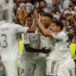 Los jugadores del Real Madrid celebran un gol ante el Olympique de Marsella