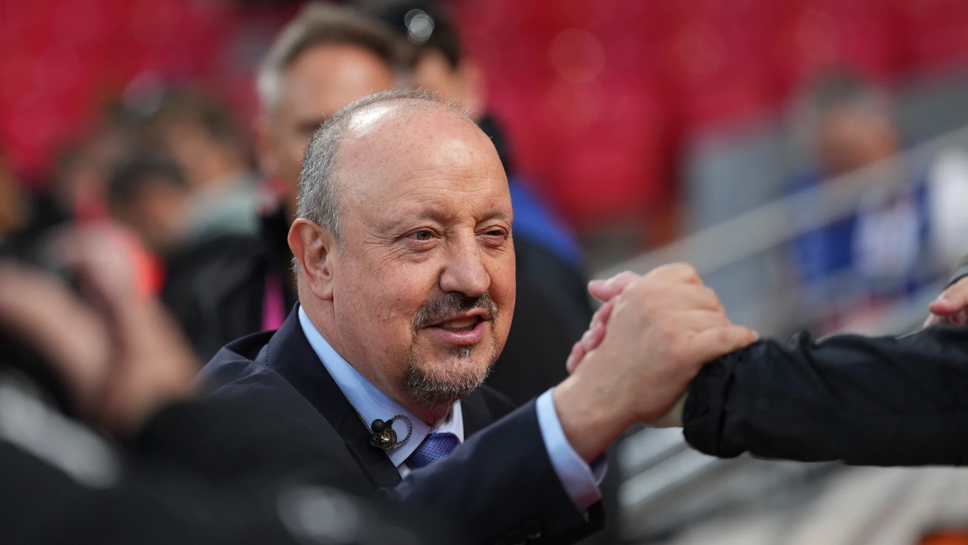 Former Liverpool coach Rafael Benitez smiles prior to the start of the Champions League opening phase soccer match between Liverpool and Atletico Madrid at Anfield stadium in Liverpool, England, Wednesday, Sept. 17, 2025. (AP Photo/Jon Super)