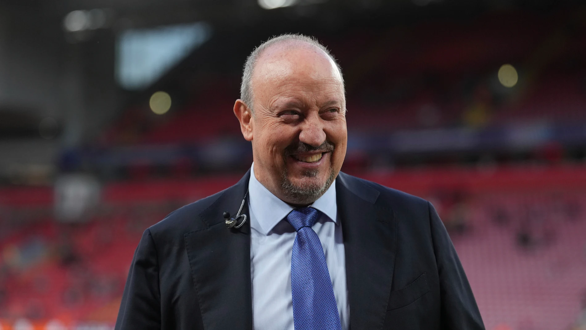 Former Liverpool coach Rafael Benitez smiles prior to the start of the Champions League opening phase soccer match between Liverpool and Atletico Madrid at Anfield stadium in Liverpool, England, Wednesday, Sept. 17, 2025. (AP Photo/Jon Super)