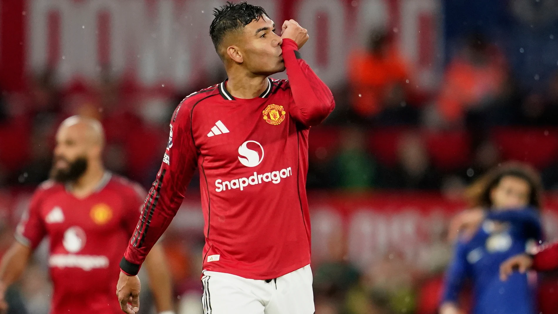 Manchester United's Casemiro celebrates after scoring his side's second goal during the English Premier League soccer match between Manchester United and Chelsea at the Old Trafford stadium in Manchester, England, Saturday, Sept. 20, 2025. (AP Photo/Dave Thompson)