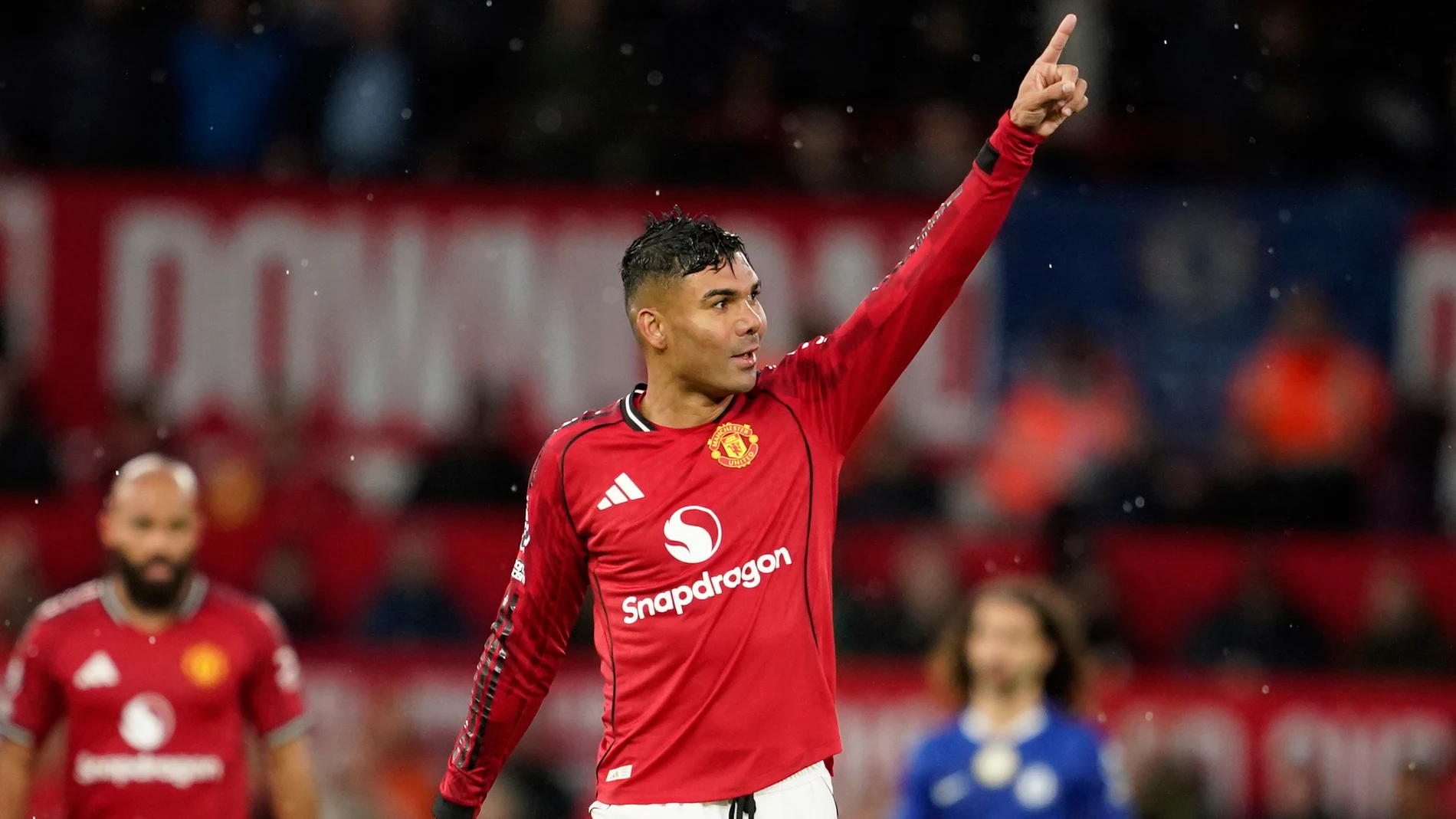 Manchester United's Casemiro celebrates after scoring his side's second goal during the English Premier League soccer match between Manchester United and Chelsea at the Old Trafford stadium in Manchester, England, Saturday, Sept. 20, 2025. (AP Photo/Dave Thompson)
