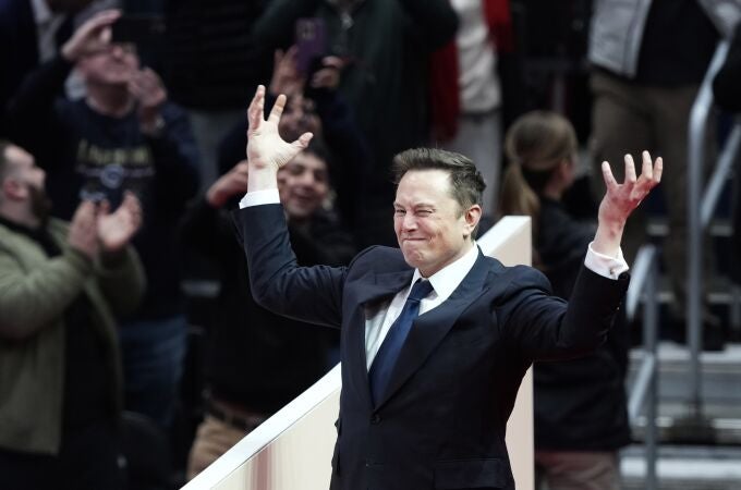 Elon Musk arrives on stage to speak at an indoor Presidential Inauguration parade event in Washington, Monday, Jan. 20, 2025. (AP Photo/Susan Walsh) Elon Musk arrives on stage to speak at an indoor Presidential Inauguration parade event in Washington, Monday, Jan. 20, 2025. (AP Photo/Susan Walsh)