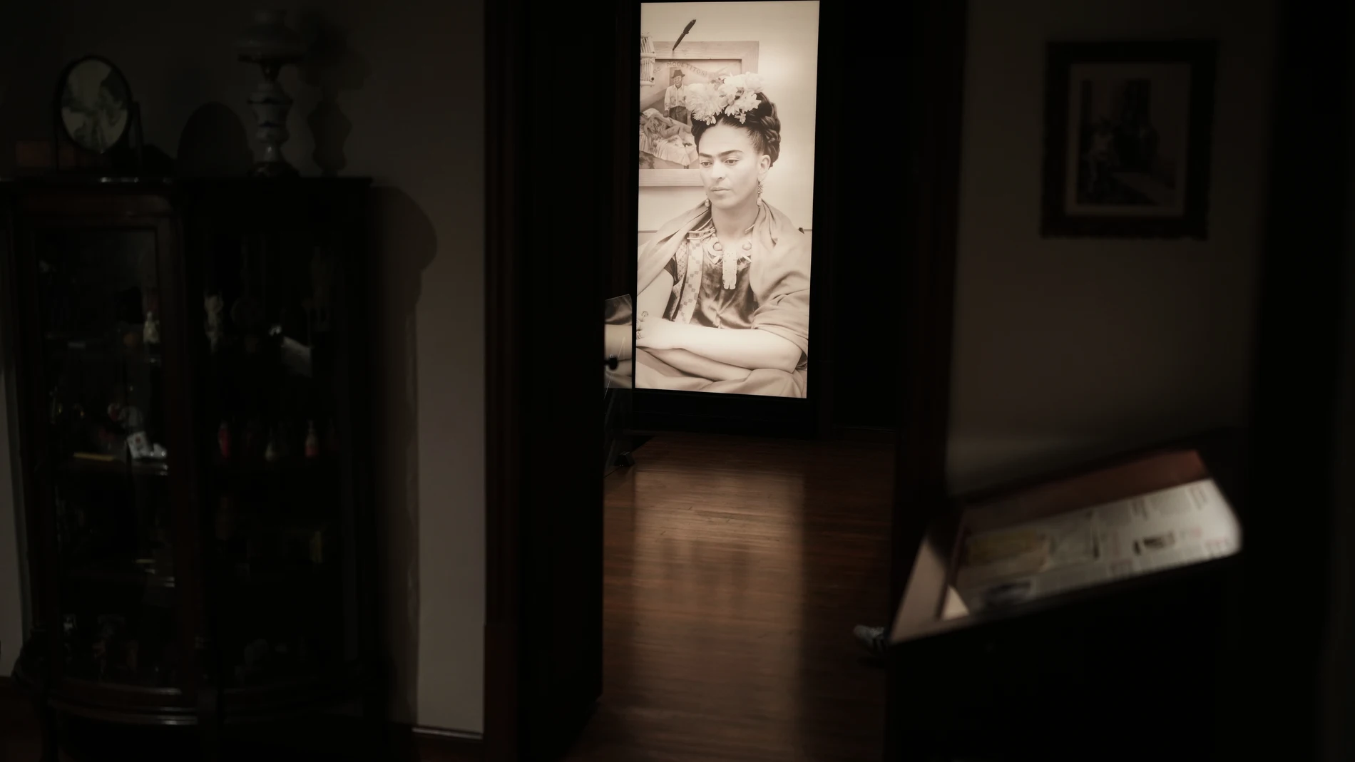 A portrait of Frida Kahlo by Mexican photographer Wallace Marly is displayed in the new museum Casa Kahlo, a house bought by Kahlo’s father after he gave the iconic Casa Azul to his daughter as a wedding gift, in Mexico City, Wednesday, Sept. 10, 2025. (AP Photo/Eduardo Verdugo)