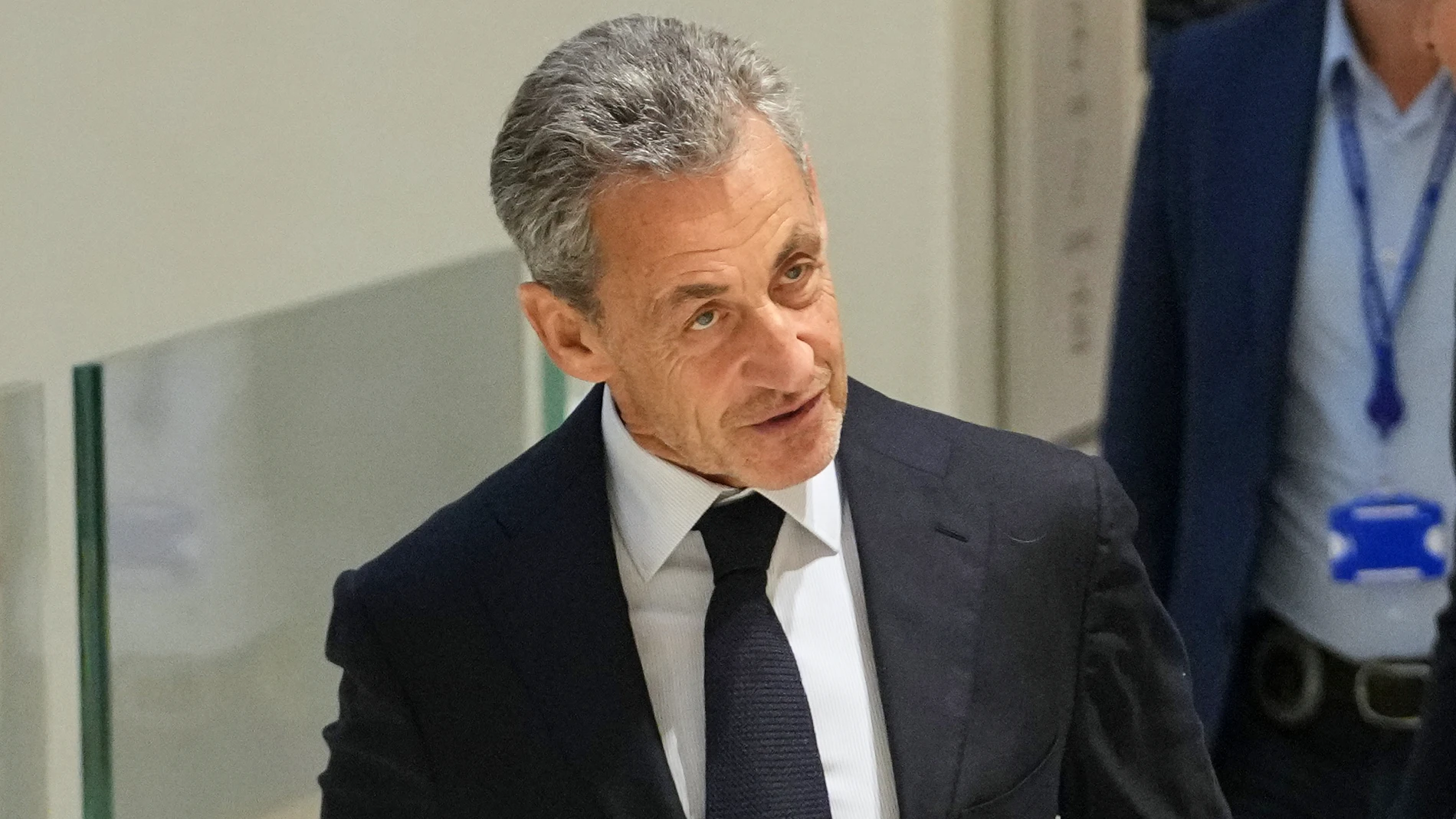 Former French President Nicolas Sarkozy arrives at the courthouse, in Paris, France, Thursday, Sept. 25, 2025. (AP Photo/Christophe Ena)