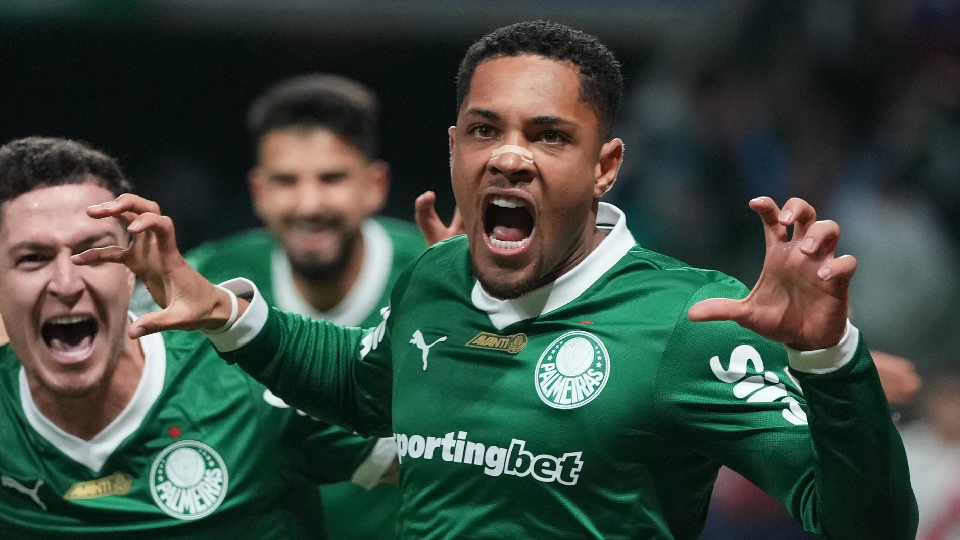 Vitor Roque of Brazil's Palmeiras celebrates scoring his side's opening goal against Argentina's River Plate during a World Cup 2026 qualifying soccer match at Neo Quimica Arena in Sao Paulo, Tuesday, June 10, 2025. (AP Photo/Andre Penner)