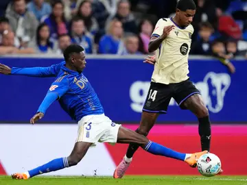 Spain Soccer La Liga Barcelona's Marcus Rashford fights for the ball against Real Oviedo's Rahim Alhassane during a Spanish La Liga soccer match at the Carlos Tartiere stadium in Oviedo, Spain, Thursday, Sept. 25, 2025. (AP Photo/Jose Breton)