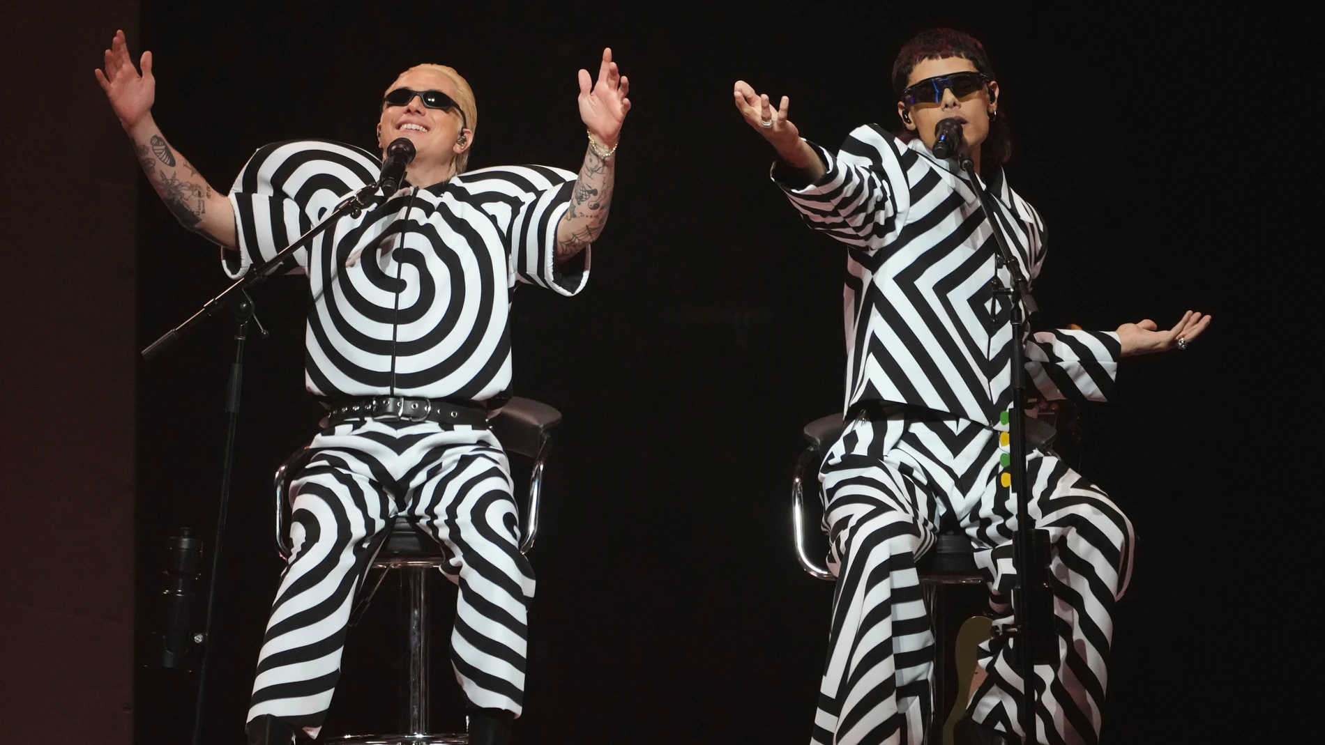 Ca7riel, right, and Paco Amoroso perform their show PAPOTA, named after their album, in Montevideo, Uruguay, Thursday, Sept. 25, 2025. (AP Photo/Matilde Campodonico)
