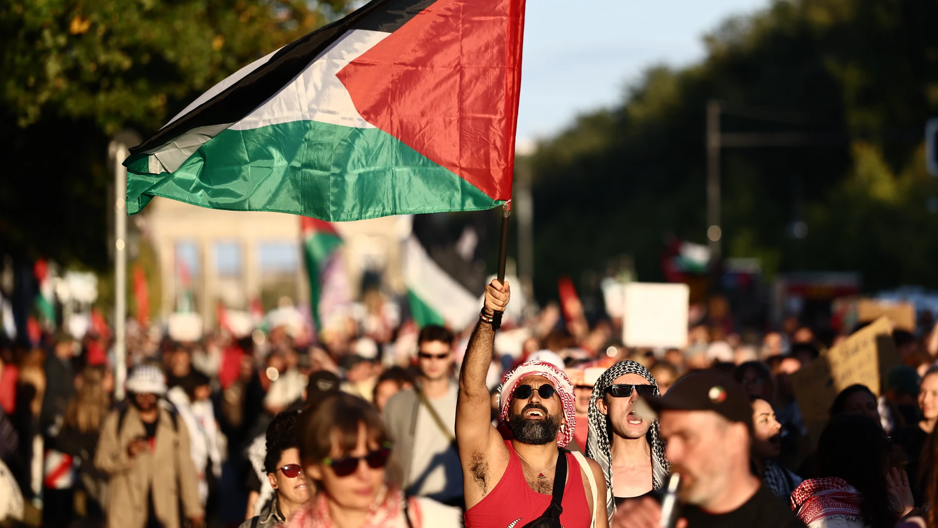 People protest against Israel during a mass demonstration called "All Eyes on Gaza" in support of Palestinians in Berlin, Germany, Saturday, Sept. 27, 2025. (AP Photo/Christoph Soeder)