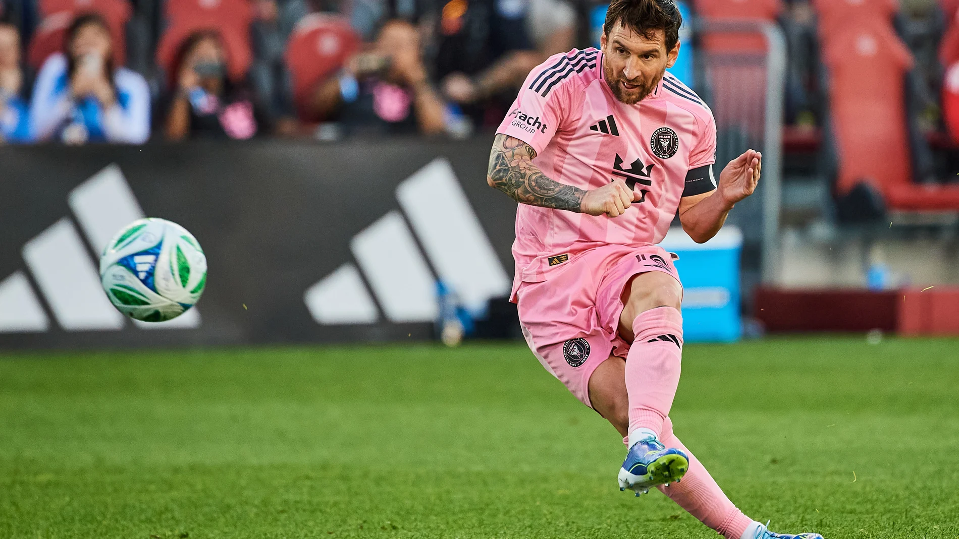 Inter Miami's Lionel Messi (10) takes a free kick against Toronto FC during the second half of a MLS soccer game, Saturday, Sept. 27, 2025, in Toronto. (Sammy Kogan/The Canadian Press via AP)