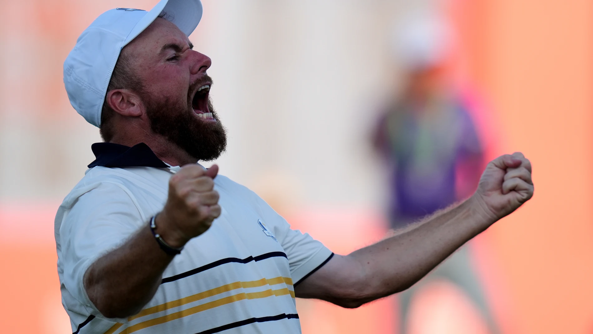 Europe's Shane Lowry celebrates after making the winning putt putt on the 18th hole during their singles match on the Bethpage Black golf course at the Ryder Cup golf tournament, Sunday, Sept. 28, 2025, in Farmingdale, N.Y. (AP Photo/Seth Wenig)