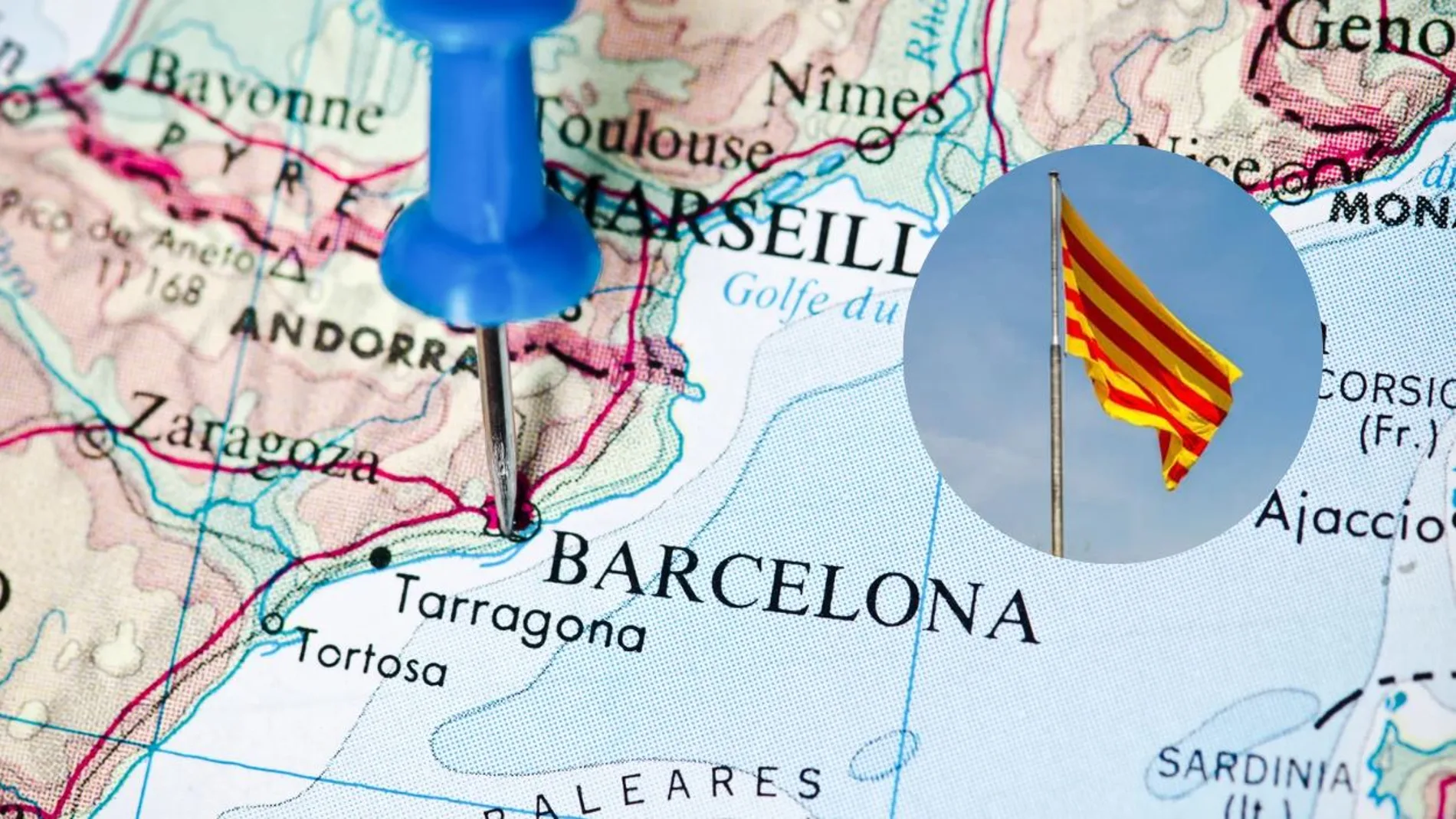 Imagen del mapa de España con una chincheta sobre Barcelona junto a una bandera de Cataluña