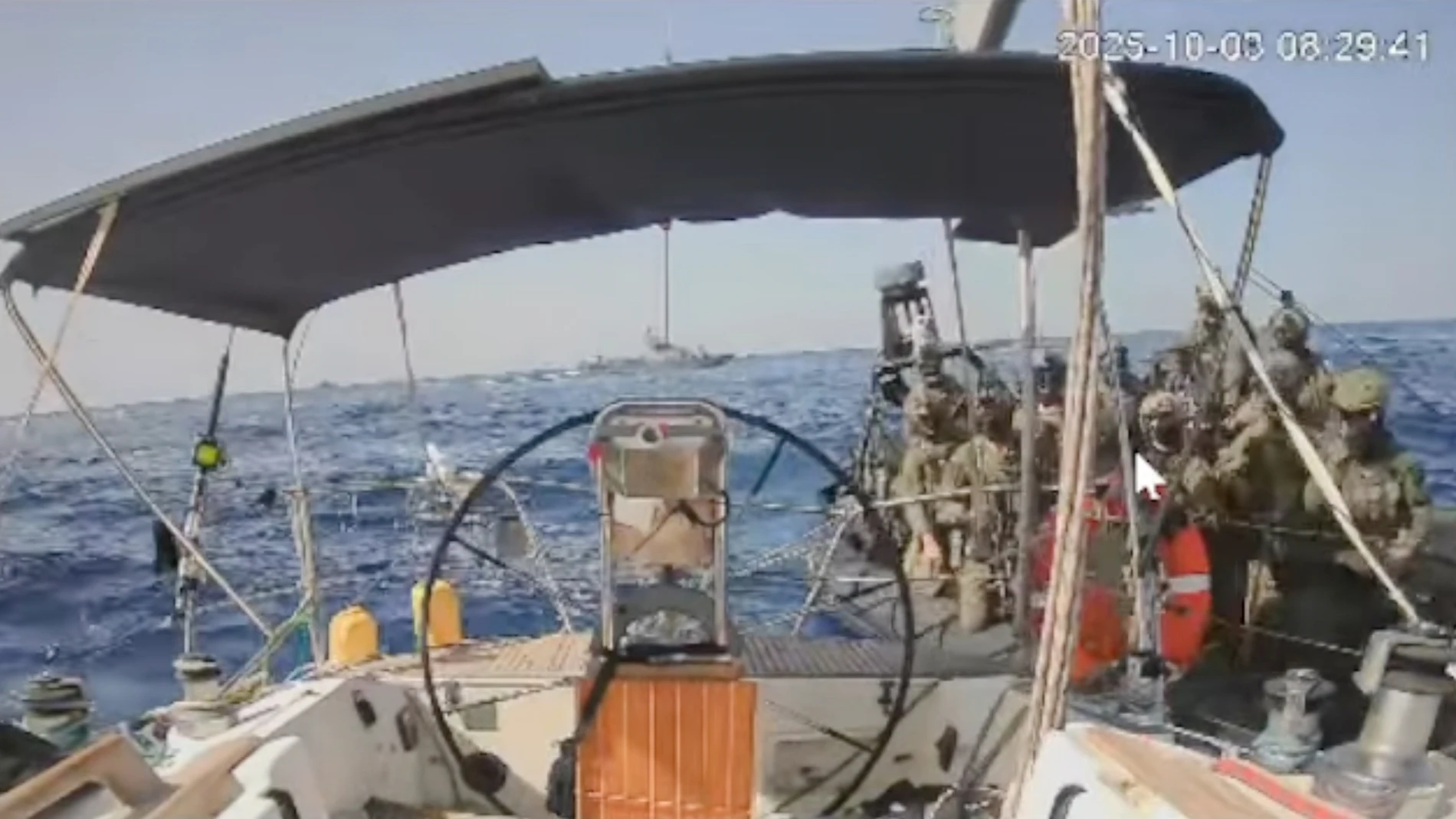 This frame grab from video released by the Global Sumud Flotilla shows Israeli forces intercepting 'Marinette', the last boat from an international flotilla trying to break Israel's sea blockade, Friday, Oct. 3, 2025. (Global Sumud Flotilla via AP)