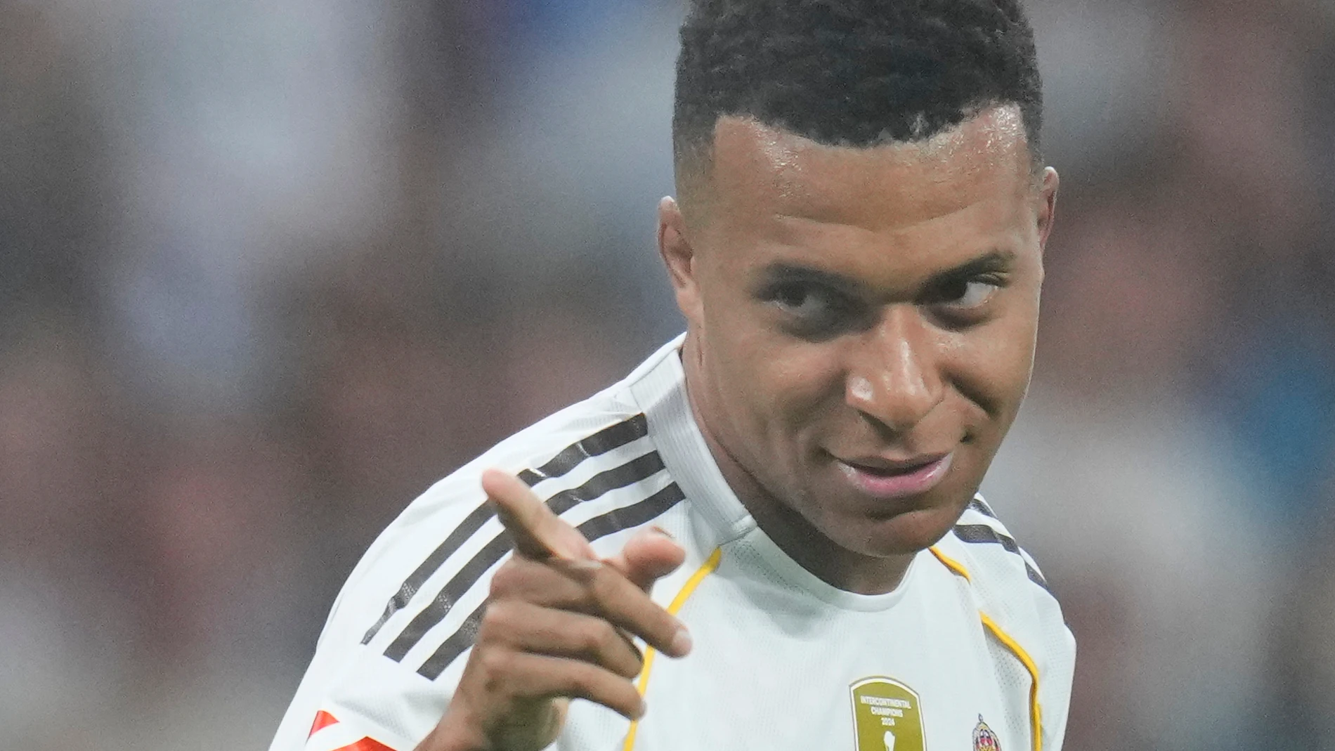Real Madrid's Kylian Mbappe celebrates after scoring his side's third goal during the Spanish La Liga soccer match between Real Madrid and Villarreal at the Santiago Bernabeu stadium in Madrid, Spain, Saturday, Oct. 4, 2025. (AP Photo/Manu Fernandez)