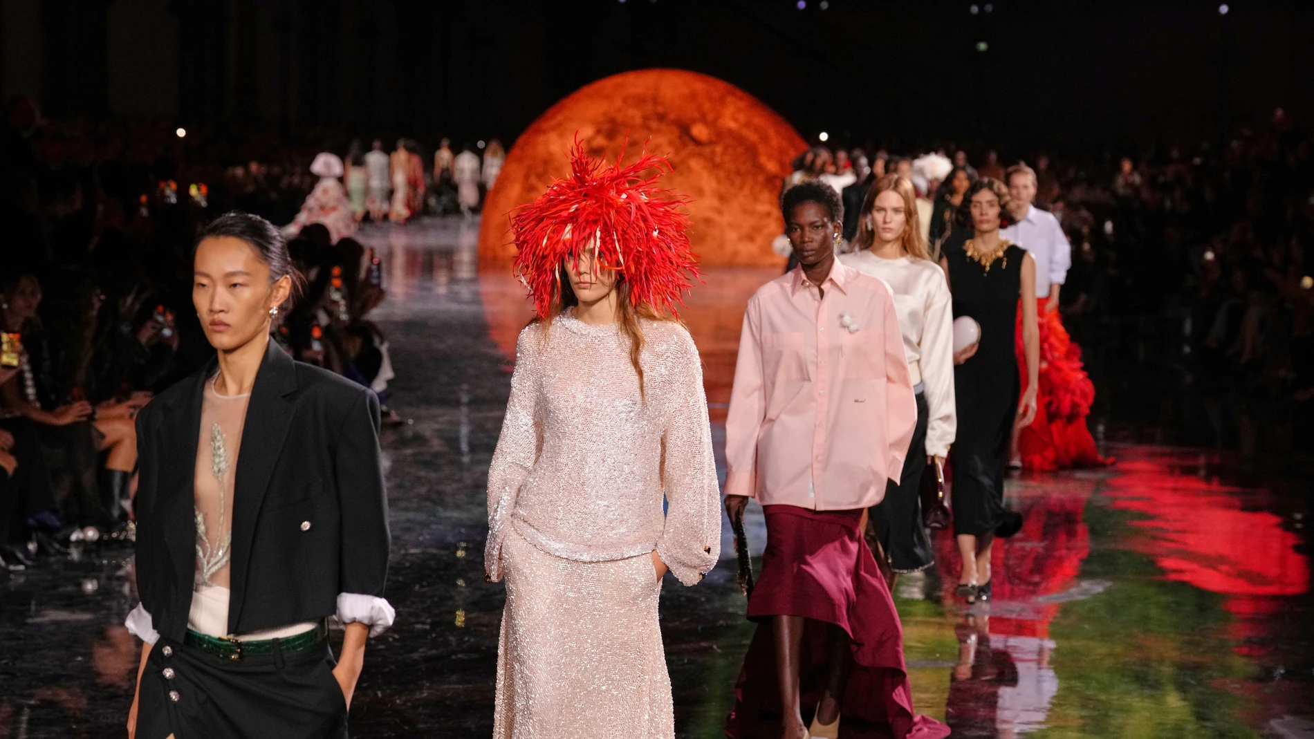 Models wear creations as part of the Chanel Spring/Summer 2026 collection presented in Paris, Monday, Oct. 6, 2025. (AP Photo/Aurelien Morissard)