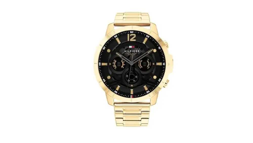Tommy Hilfiger dorado con caja grande y estética de lujo discreto