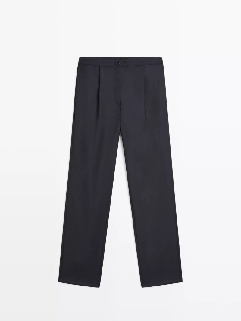 Pantalón de pinzas con cintura elástica.