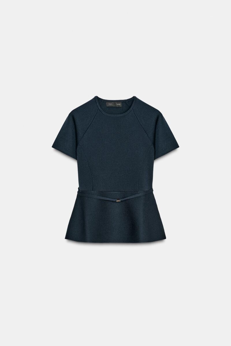 Top de punto peplum.