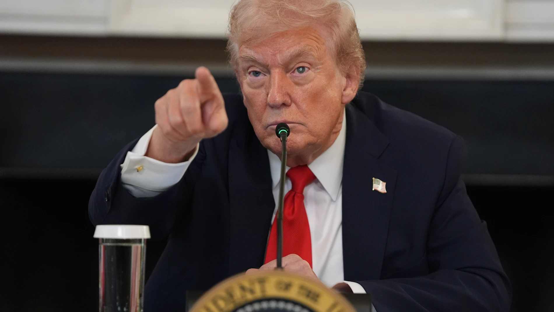 President Donald Trump speaks during a roundtable meeting on antifa in the State Dining Room at the White House, Wednesday, Oct. 8, 2025, in Washington. (AP Photo/Evan Vucci)