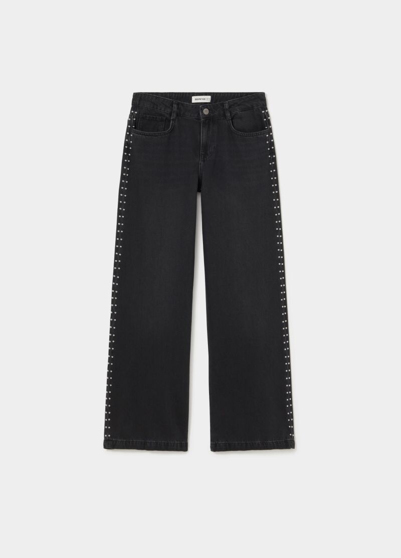 Jeans wideleg tachas.