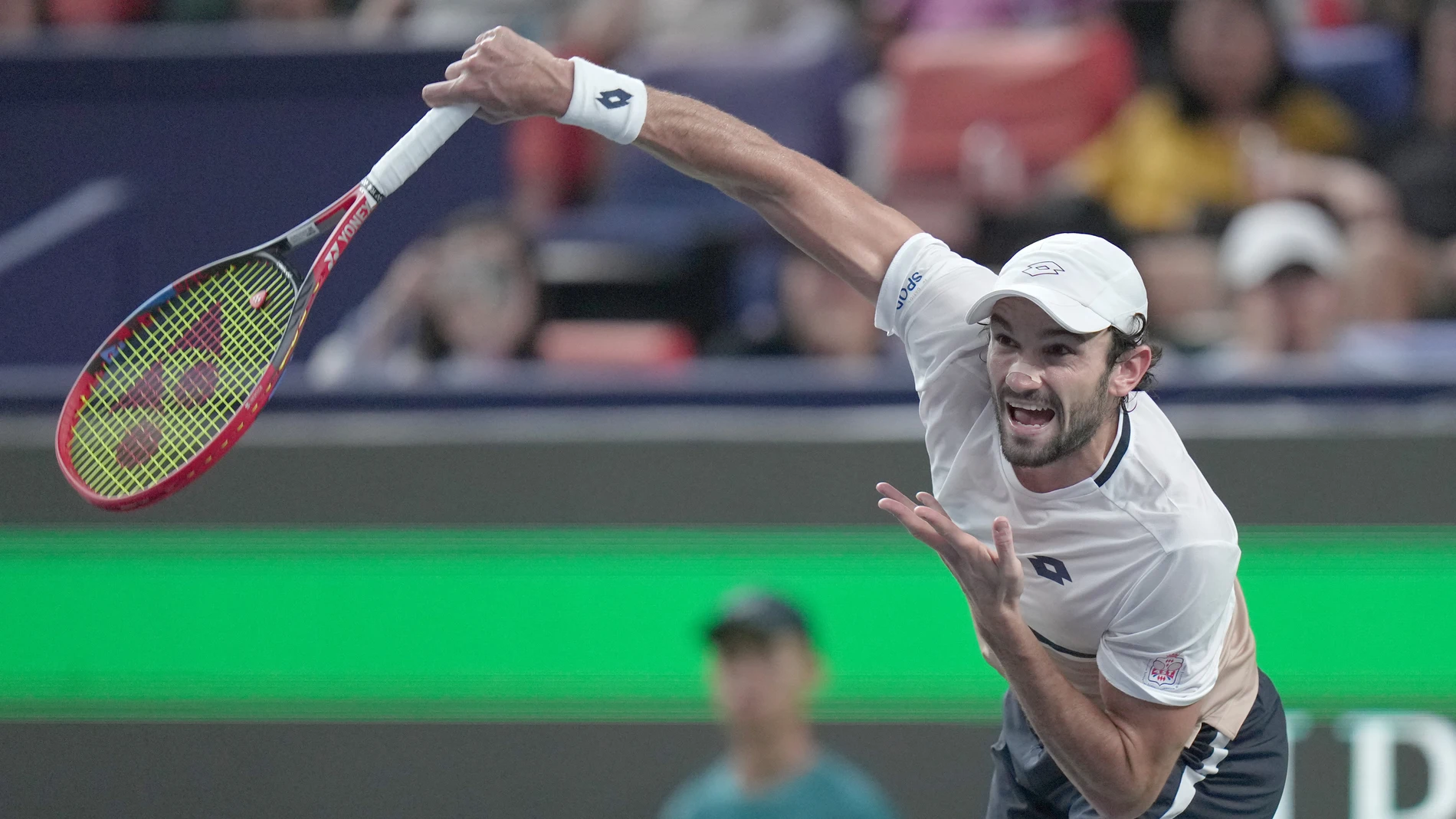 Valentin Vacherot of Monaco serves to Arthur Rinderknech of France during the final of the Shanghai Masters tennis tournament at Qizhong Forest Sports City Tennis Center, in Shanghai, China, Sunday, Oct. 12, 2025. (AP Photo/Andy Wong)