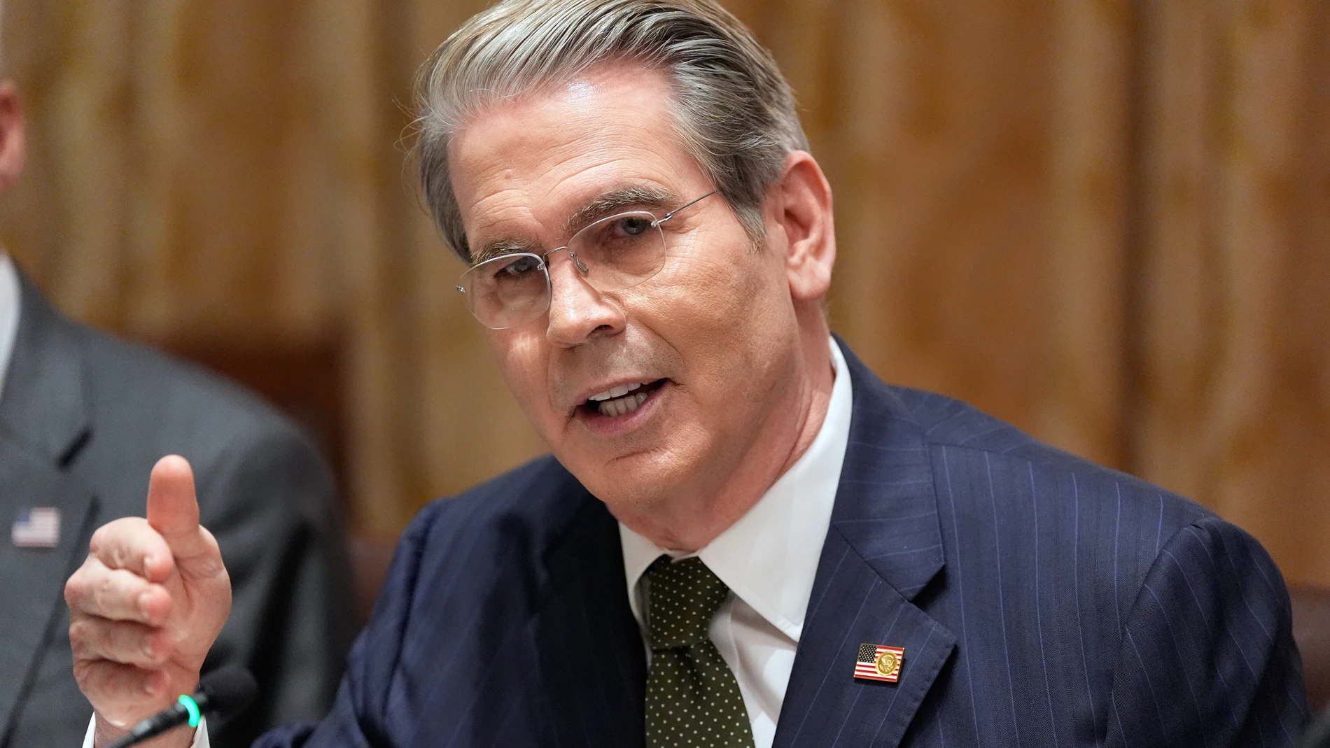 Treasury Secretary Scott Bessent speaks as President Donald Trump meets with Argentina's President Javier Milei in the Cabinet Room of the White House, Tuesday, Oct. 14, 2025, in Washington. (AP Photo/Alex Brandon)