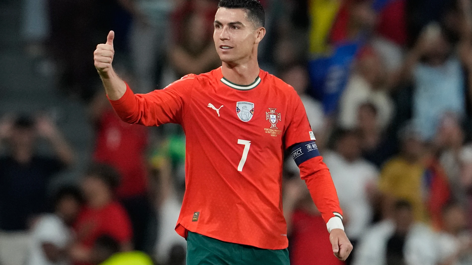 Portugal's Cristiano Ronaldo celebrates after scoring during a World Cup 2026 group F qualifying soccer match between Portugal and Hungary in Lisbon, Tuesday, Oct. 14, 2025. (AP Photo/Armando Franca)