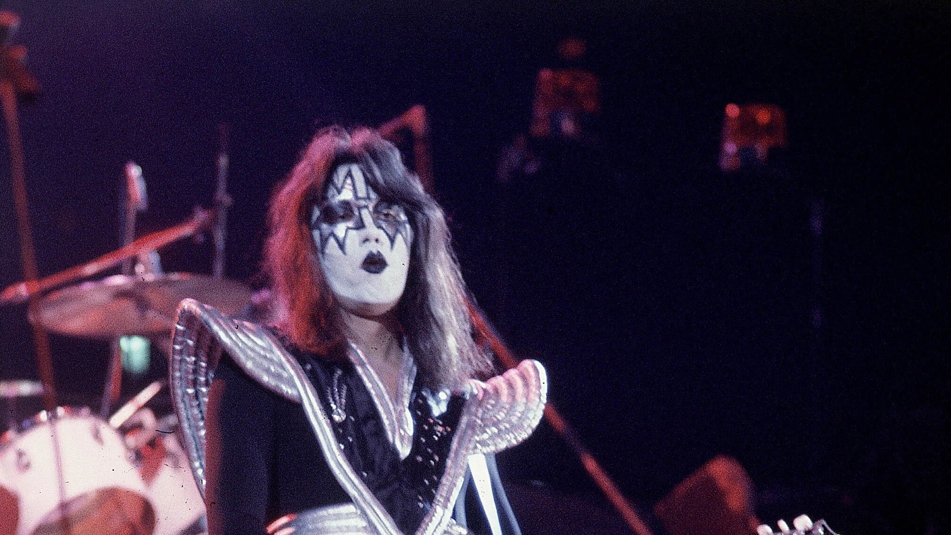FILE - Ace Frehley, lead guitarist for the hard-rock glam band KISS, performs with a Les Paul guitar during a concert at the Civic Center in Harford, Conn., Feb. 16, 1977. (AP Photo/Richard Drew, File)