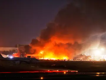 APTOPIX Bangladesh Airport Fire Fire and smoke are visible in the cargo area of Hazrat Shahjalal International Airport in Dhaka, Bangladesh, Saturday, Oct. 18, 2025. (AP Photo/Rajib Dhar)