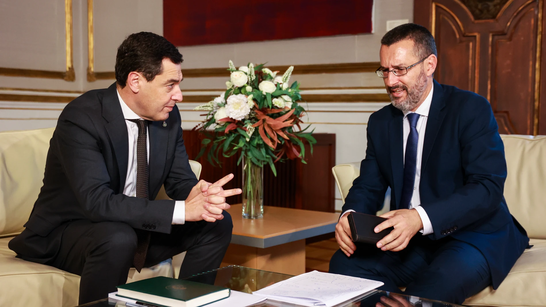 Juanma Moreno y Juan Franco