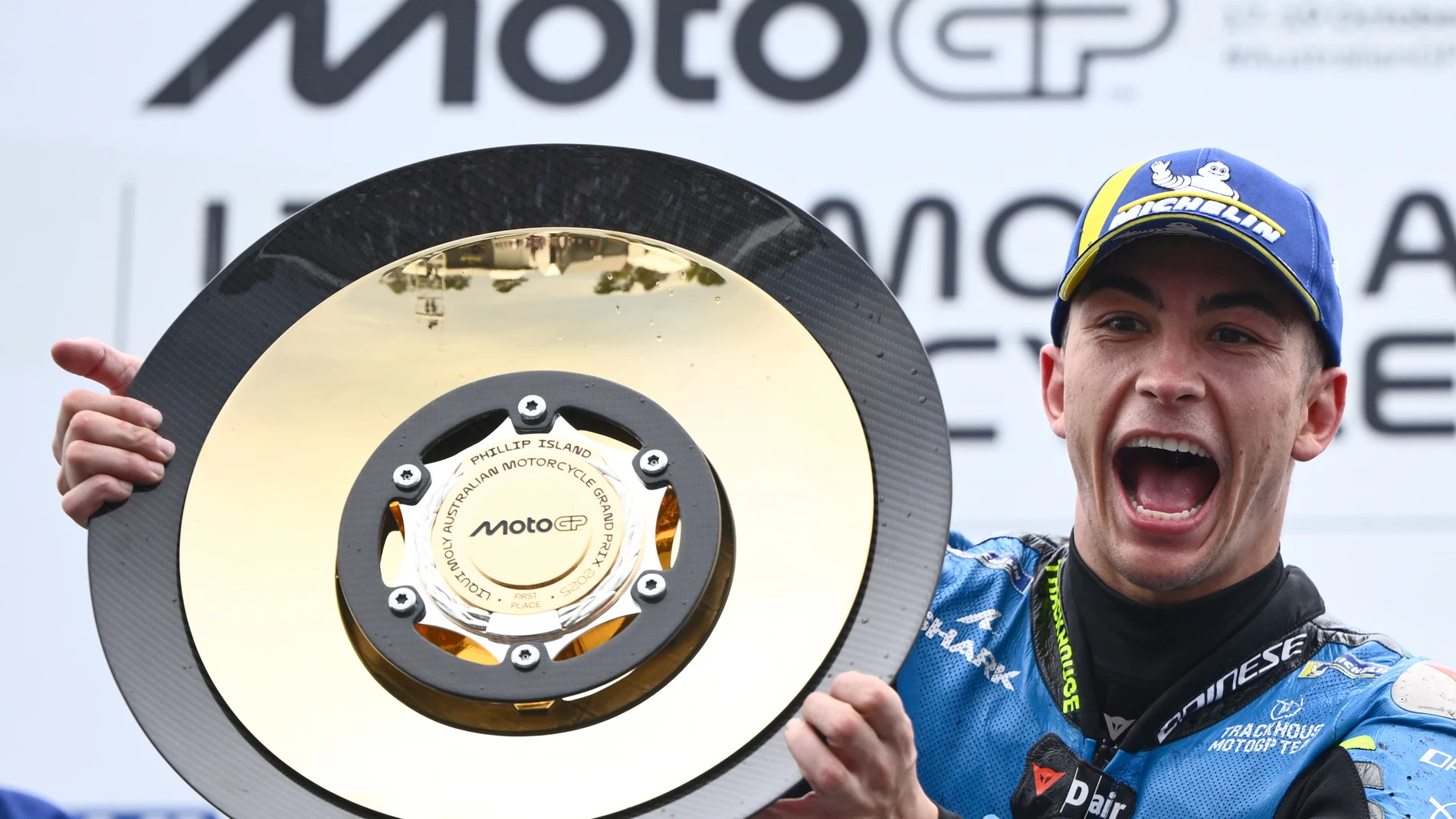 Raul Fernandez of Spain for Trackhouse Racing celebrates after winning the MotoGP at the Australian Motorcycle Grand Prix at Phillip Island, Australia, Sunday, Oct. 19, 2025. (Joel Carrett/AAPImage via AP)