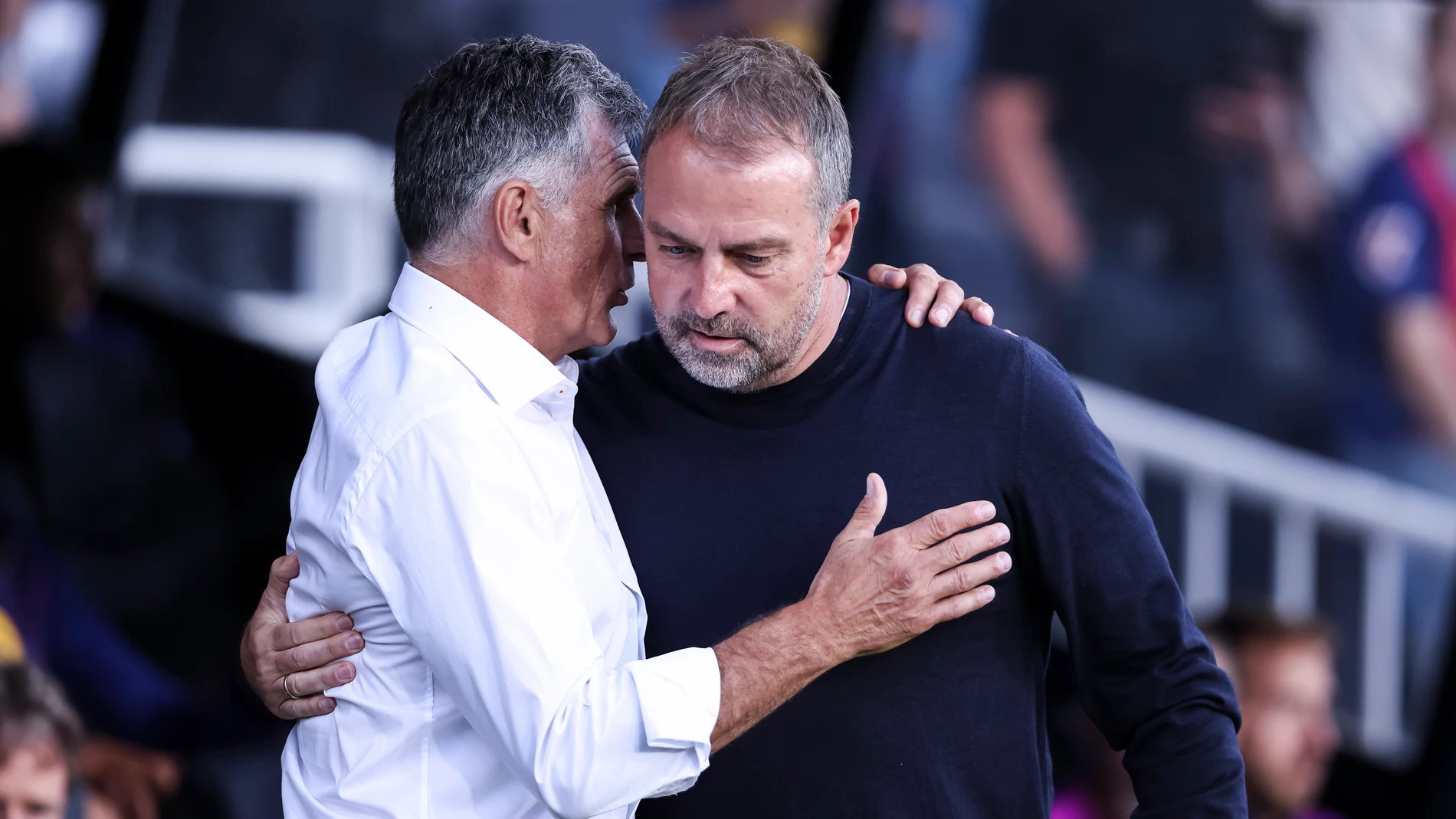 Hansi Flick, head coach of FC Barcelona greets to Jose Luis Mendilibar, head coach of Olympiacos FC during the UEFA Champions League 2025/26 League Phase MD3 match between FC Barcelona and Olympiacos FC at Estadi Olimpic Lluis Companys on October 21, 2025 in Barcelona, Spain. AFP7 21/10/2025 ONLY FOR USE IN SPAIN