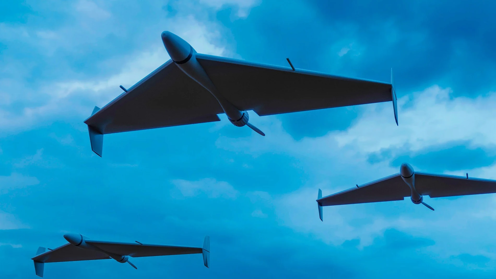 Drones kamikaze con forma de ala delta volando en una imagen de arte conceptual