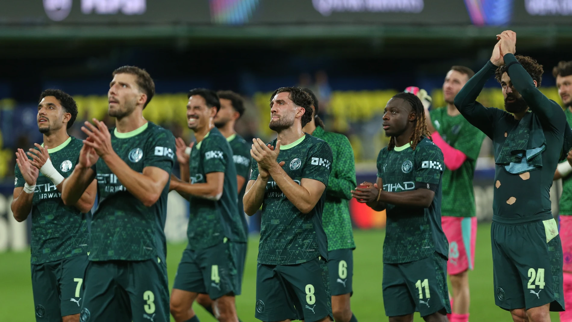 Manchester City players applaud supporters at the end of the Champions League opening phase soccer match between Villarreal and Manchester City in Villarreal, Spain, Tuesday, Oct. 21, 2025. (AP Photo/Alberto Saiz)