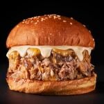 Con su jugosa carne gracias al cochinillo desmenuzado, promete convertirse en la burger más deseada de la temporada 