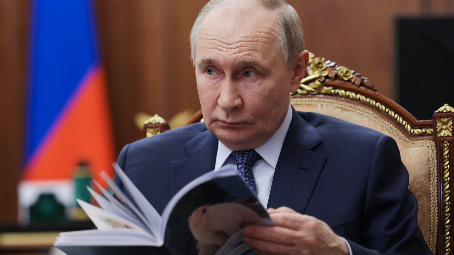 Russian President Vladimir Putin listens to the head of the Federal Service for Supervision of Natural Resources (Rosprirodnadzor) Svetlana Radionova during their meeting at the Kremlin in Moscow, Russia, on Tuesday, Oct. 21, 2025. (Alexander Kazakov, Sputnik, Kremlin Pool Photo via AP)