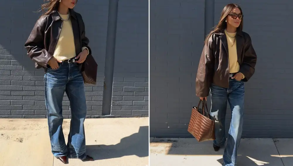 Look con cazadora de piel marrón, jersey claro y vaqueros largos con punta visible: un ejemplo perfecto de cómo alargar visualmente la figura sin necesidad de tacones.