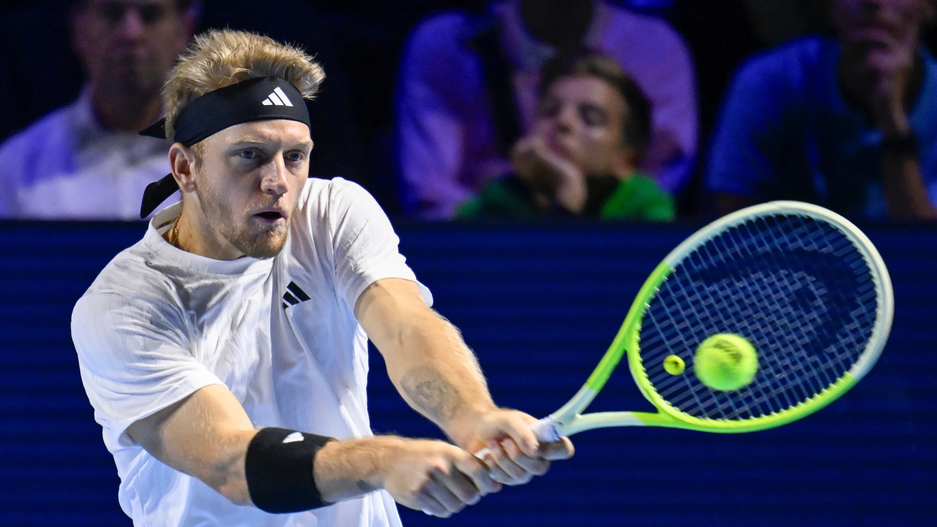 Spain's Alejandro Davidovich Fokina returns a return to France's Ugo Humbert during a semifinal match at the Swiss Indoors tennis tournament in Basel, Switzerland, on Saturday, Oct. 25, 2025. (Georgios Kefalas/Keystone via AP)