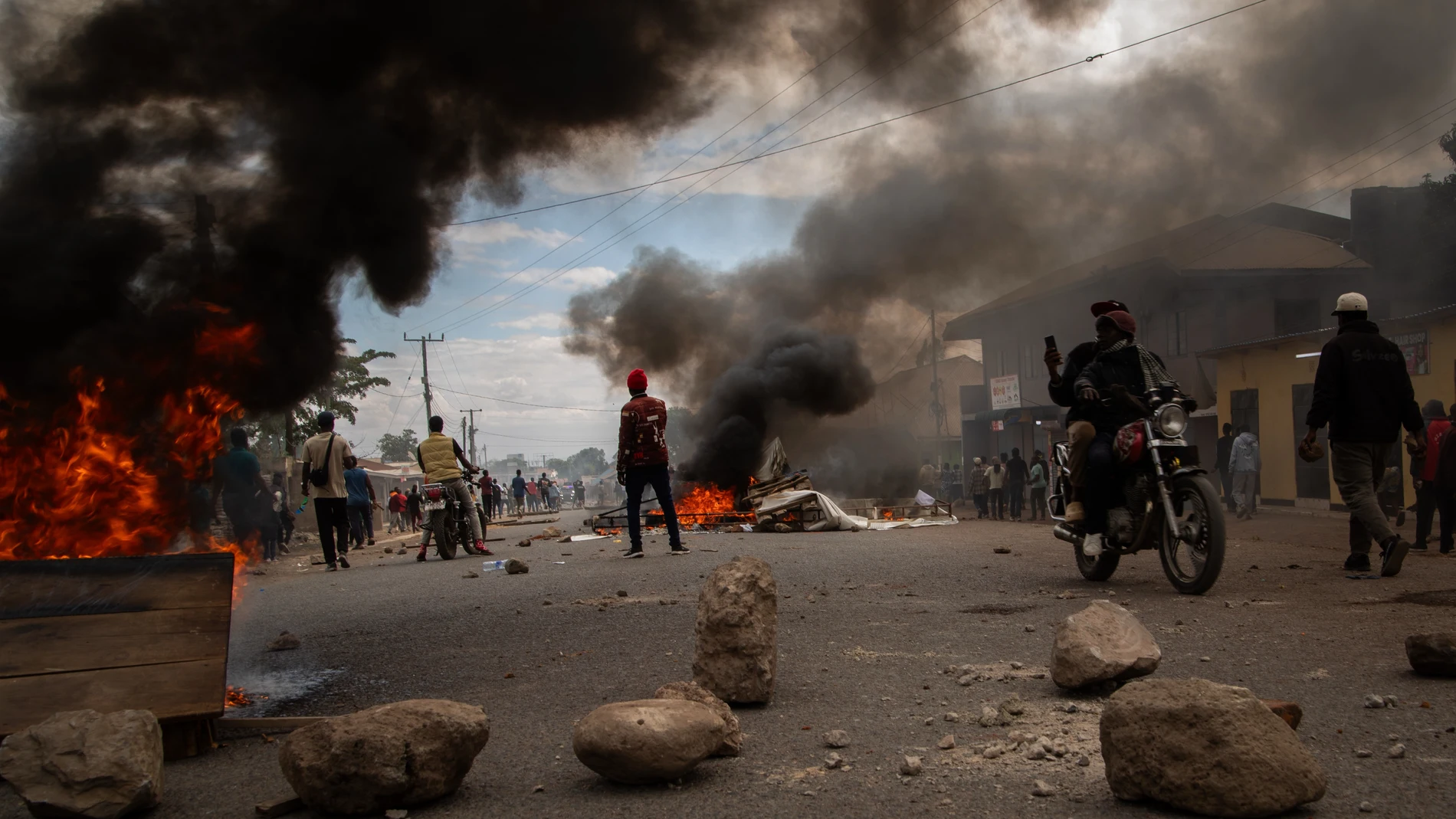 People protest in the streets of Arusha, Tanzania, on election day Wednesday, Oct. 29, 2025. (AP Photo/str)
