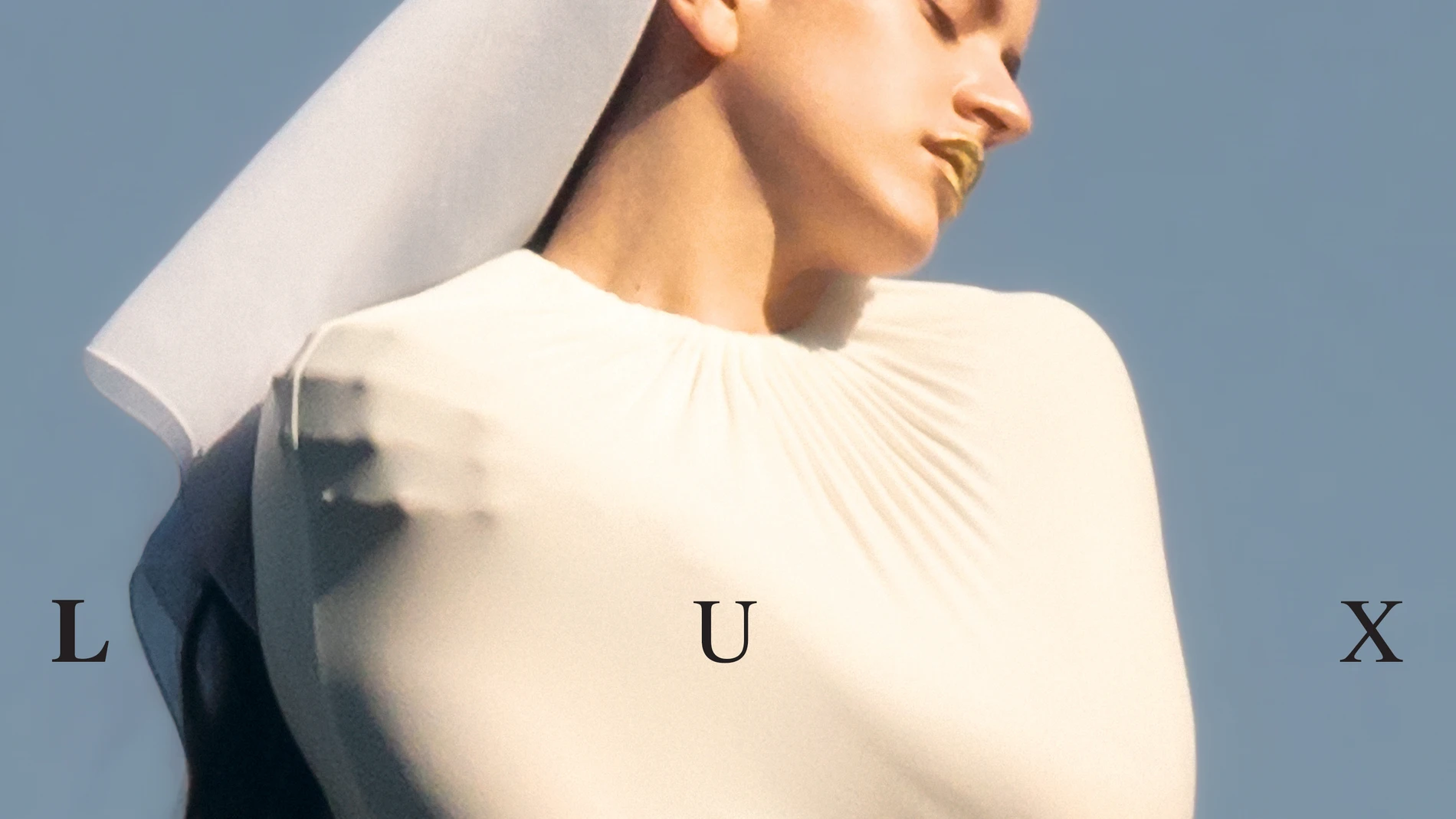 This image released by Columbia Records shows "LUX" by Rosalía. (Columbia Records via AP)