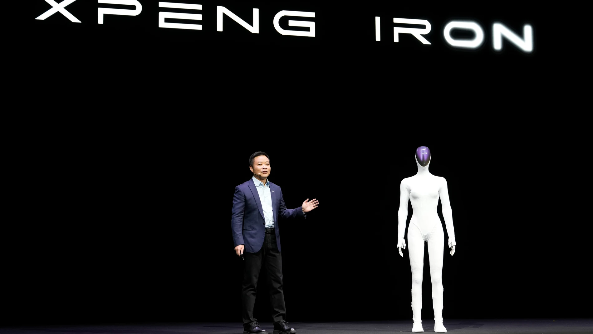 He Xiaopeng, Chairman and CEO of XPENG unveils the next generation IRON robot during the XPENG AI Day held at the company headquarters in Guangzhou in southern China's Guangdong province, Wednesday, Nov. 5, 2025. (AP Photo/Ng Han Guan)