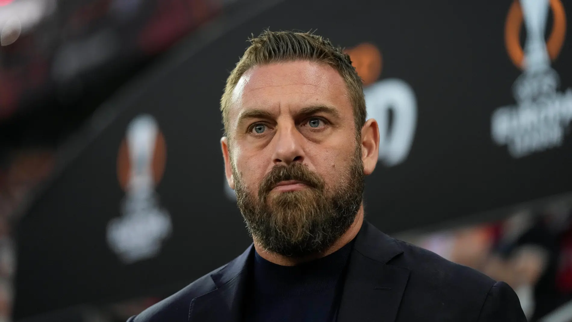 FILE - Then-Roma's head coach Daniele De Rossi waits for the start of the Europa League second leg semi-final soccer match between Leverkusen and Roma at the BayArena in Leverkusen, Germany, Thursday, May 9, 2024. (AP Photo/Matthias Schrader, File)