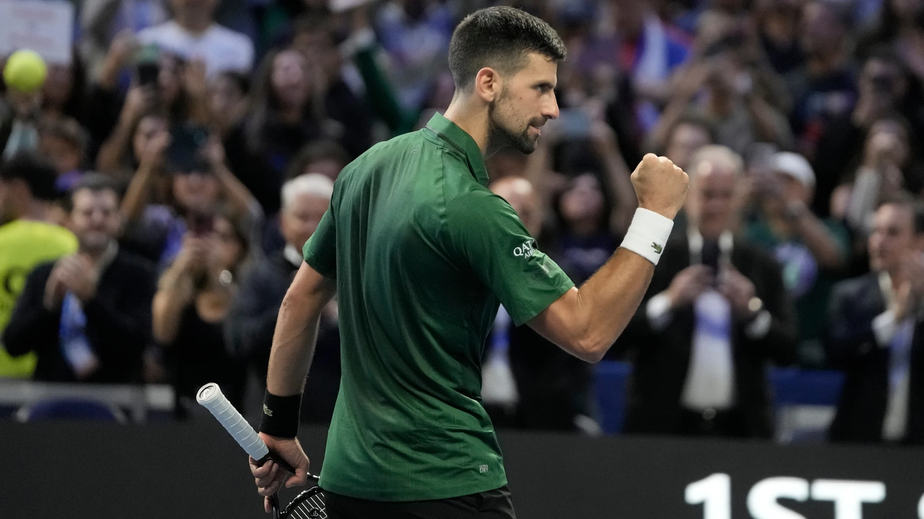 Novak Djokovic of Serbia celebrates after his win against Yannick Hanfmann of Germany during the ATP250 tennis tournament, in Athens, Greece, Friday, Nov. 7, 2025. (AP Photo/Thanassis Stavrakis)