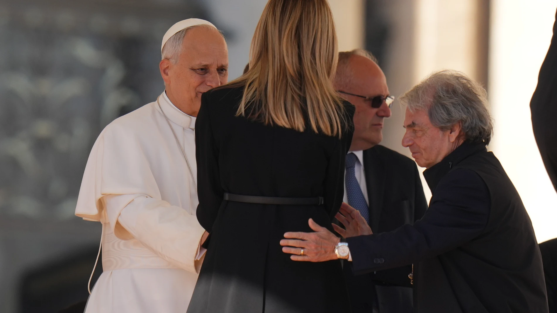 CNEL (The National Council for Economics and Labour) President Renato Brunetta, right, queue to greet Pope Leo XIV during a Jubilee open-air audience in St. Peter's Square, at the Vatican, Saturday, Nov. 8, 2025. (AP Photo/Alessandra Tarantino)