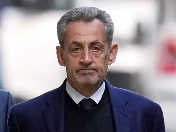 France Sarkozy FILE - Former French President Nicolas Sarkozy leaves his home Tuesday, Oct. 21, 2025 in Paris as he heads to prison to serve time for a criminal conspiracy to finance his 2007 election campaign with funds from Libya. (AP Photo/Thibault Camus, File)