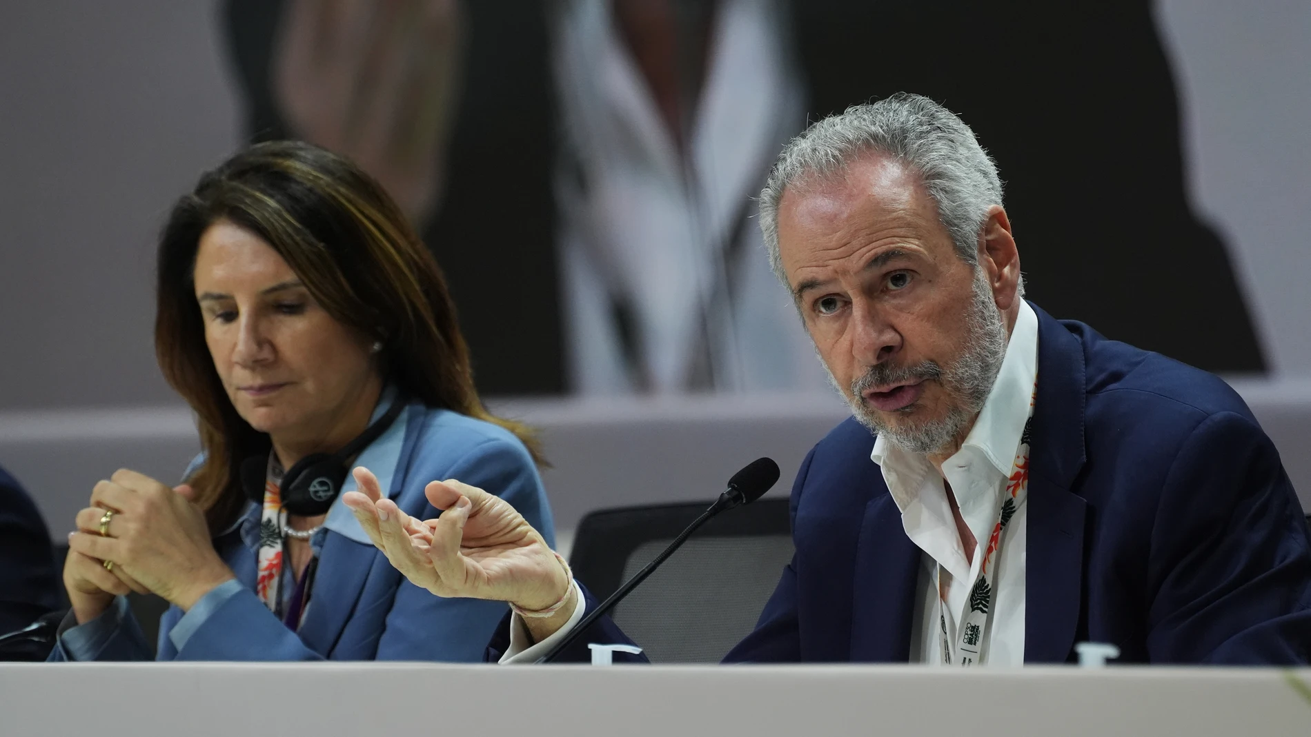 Ana Toni, COP30 CEO, left, sits next to André Corrêa do Lago, COP30 president, as he speaks at a news conference during the COP30 U.N. Climate Summit, Saturday, Nov. 15, 2025, in Belem, Brazil. (AP Photo/Joshua A. Bickel)