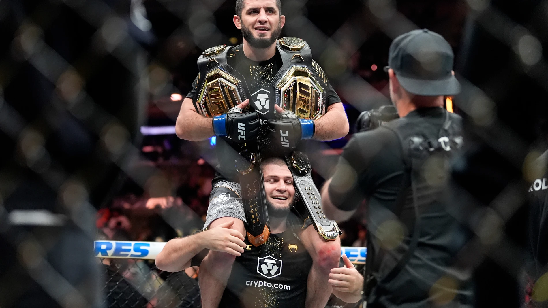 Russia's Islam Makhachev celebrates after defeating Australia's Jack Della Maddalena during a welterweight title bout at the UFC 322 mixed martial arts event, Saturday, Nov. 15, 2025, in New York. (AP Photo/Yuki Iwamura)