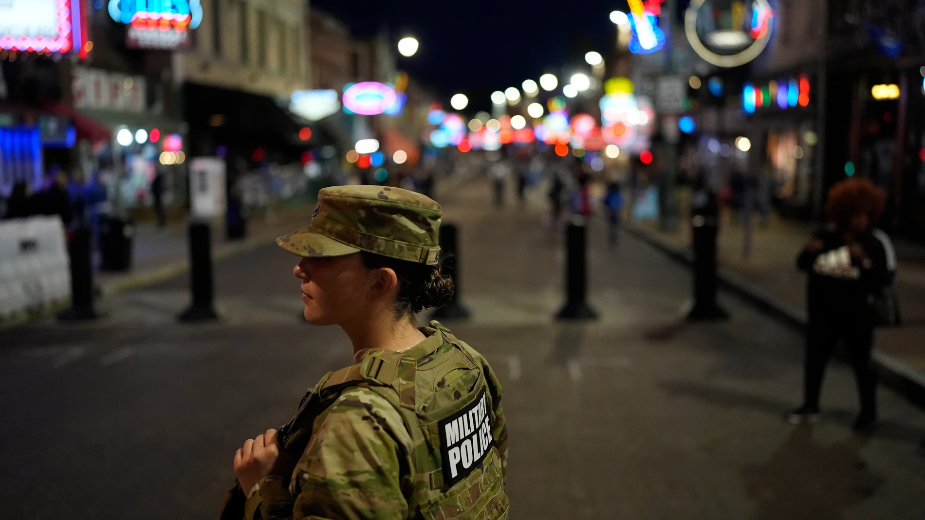 FILE - A member of the National Guard stands watch on Beale Street Oct. 24, 2025, in Memphis, Tenn. (AP Photo/George Walker IV, File)